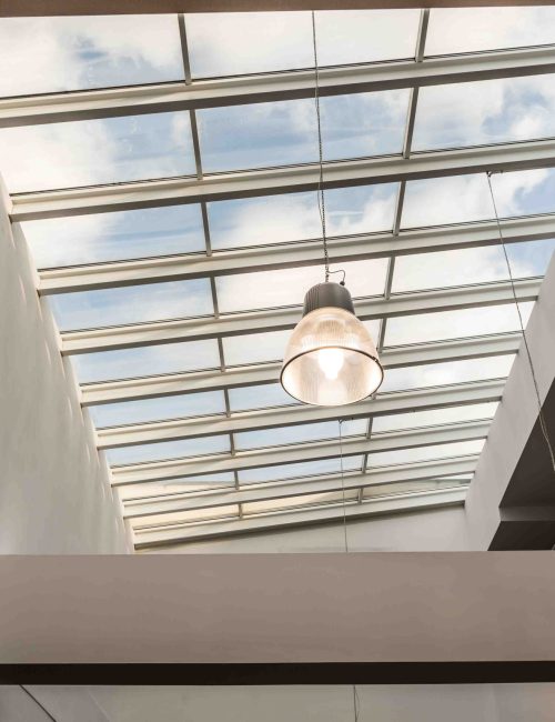 modern-building-with-glass-roof-2026-01-05-22-54-39-utc_11zon